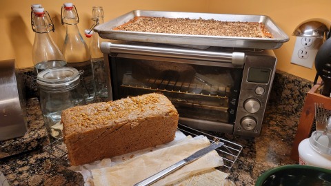 Buckwheat products Roasted sprouted groats in pan; buckwheat blender bread loaf below